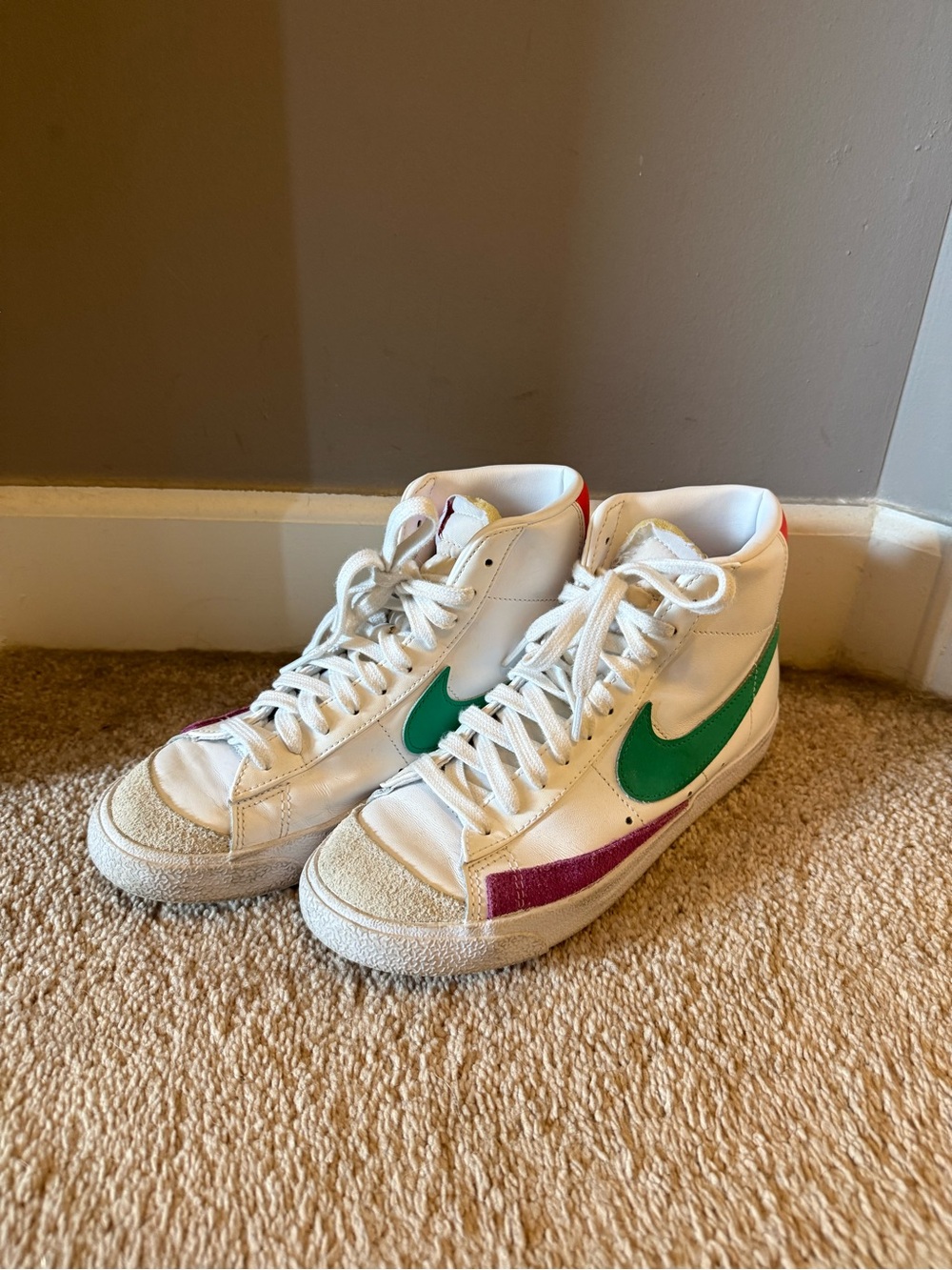 Nike White High-Top Sneakers with Green Swoosh and Pink Accents